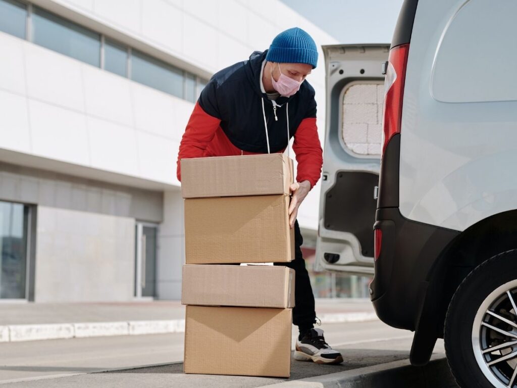 Man moving new boxes