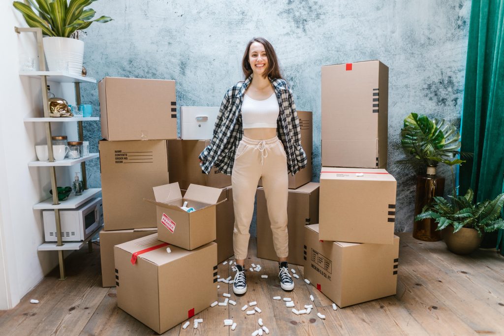 Student with storage boxes