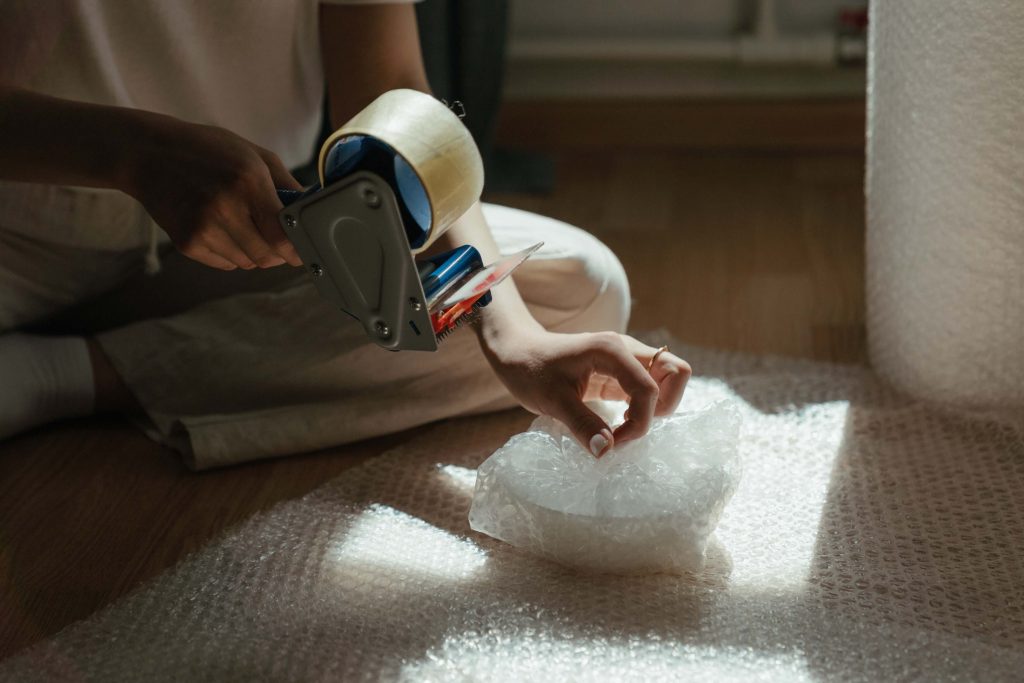 Using a tape gun and bubble wrap